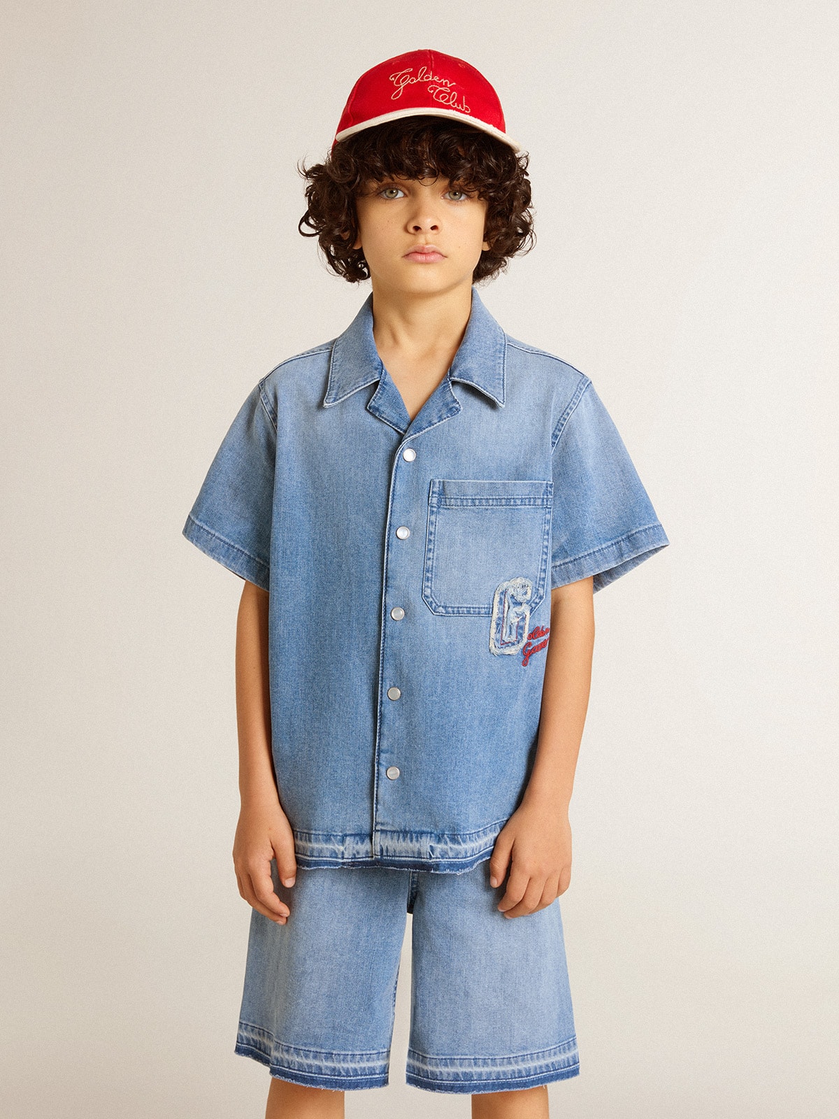 Kids' denim shorts with embroidery on the back