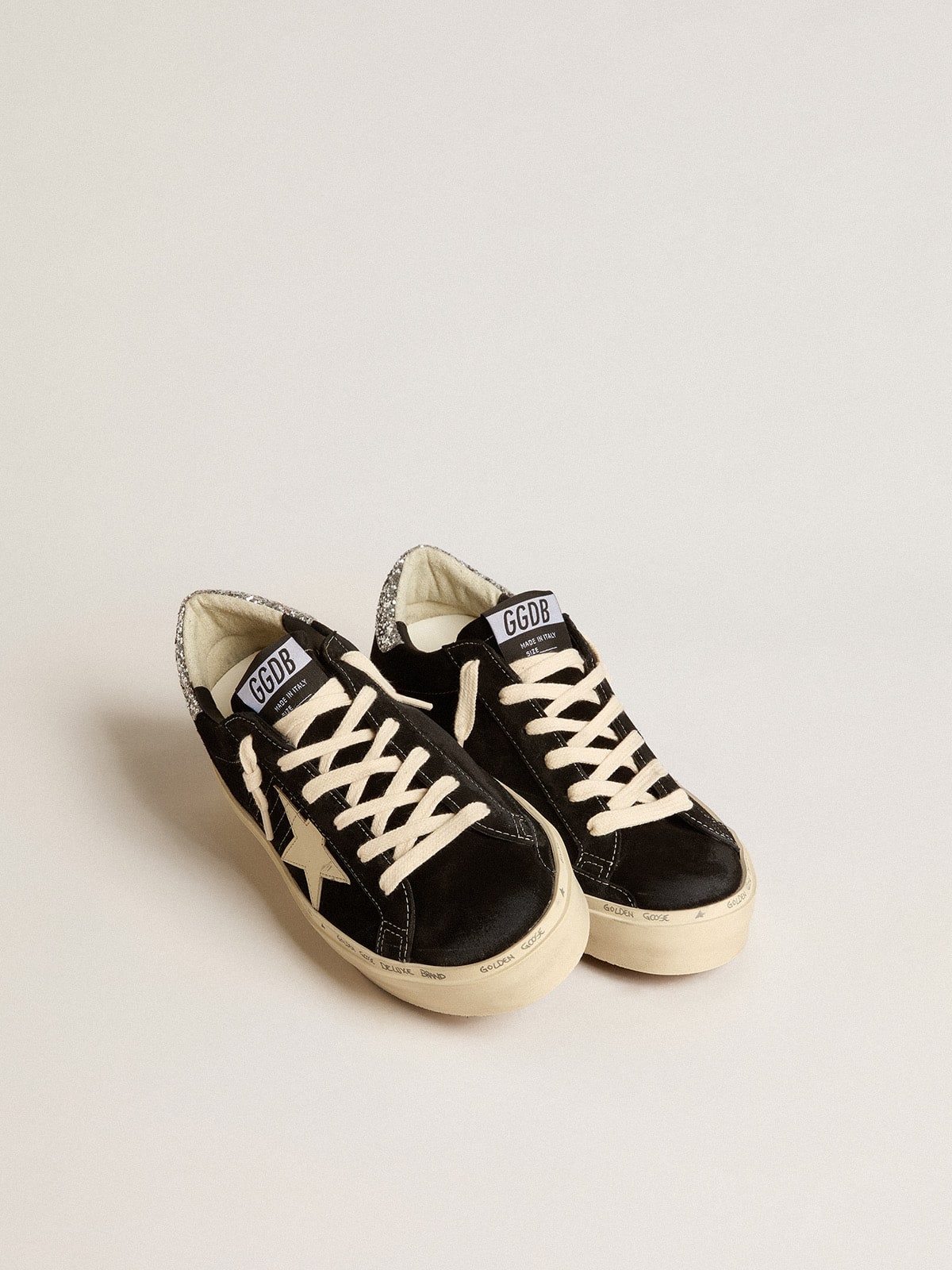 Women's Hi Star in black leather with silver glitter heel tab