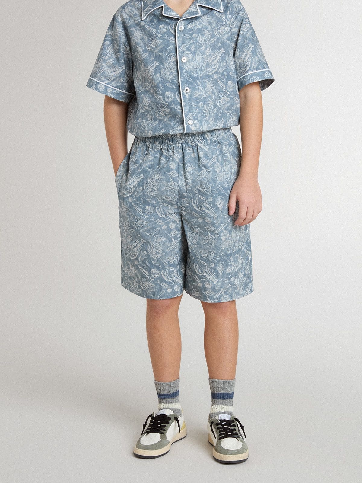 Boys' blue shorts with white print