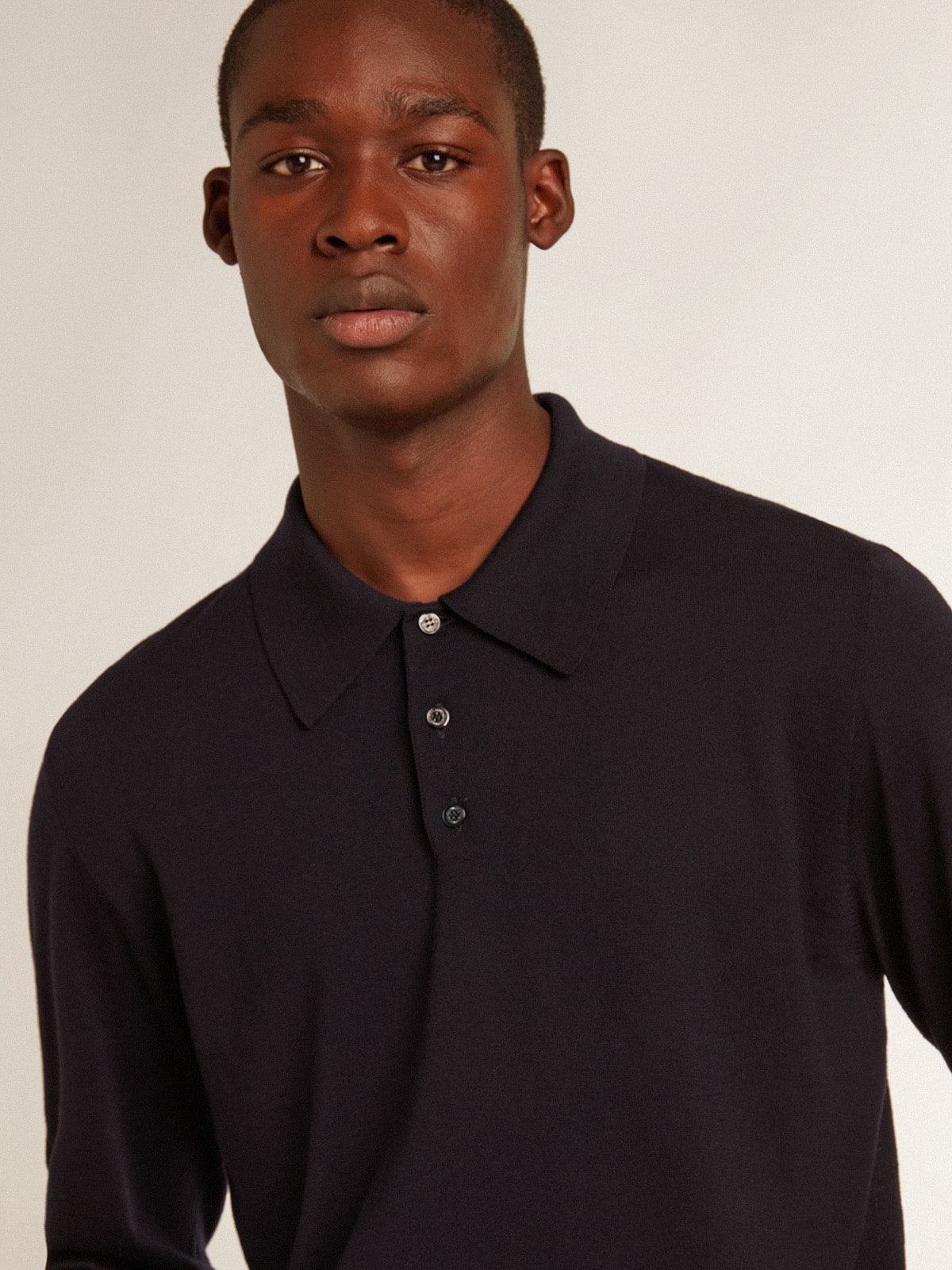 Men's long-sleeved polo shirt in navy-blue merino wool