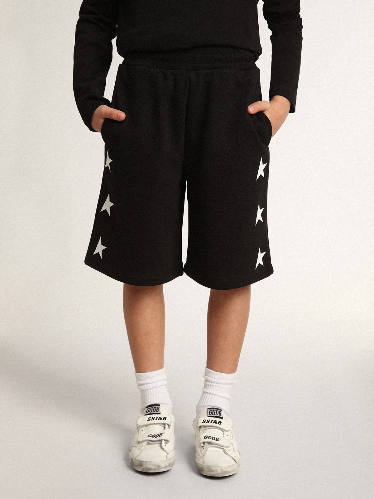 Boys' black Bermuda shorts with white stars