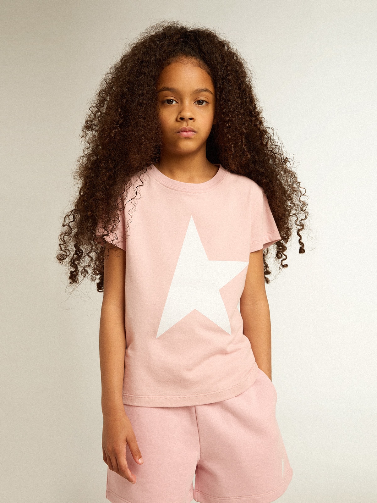 Girls' pink T-shirt with white logo and maxi star