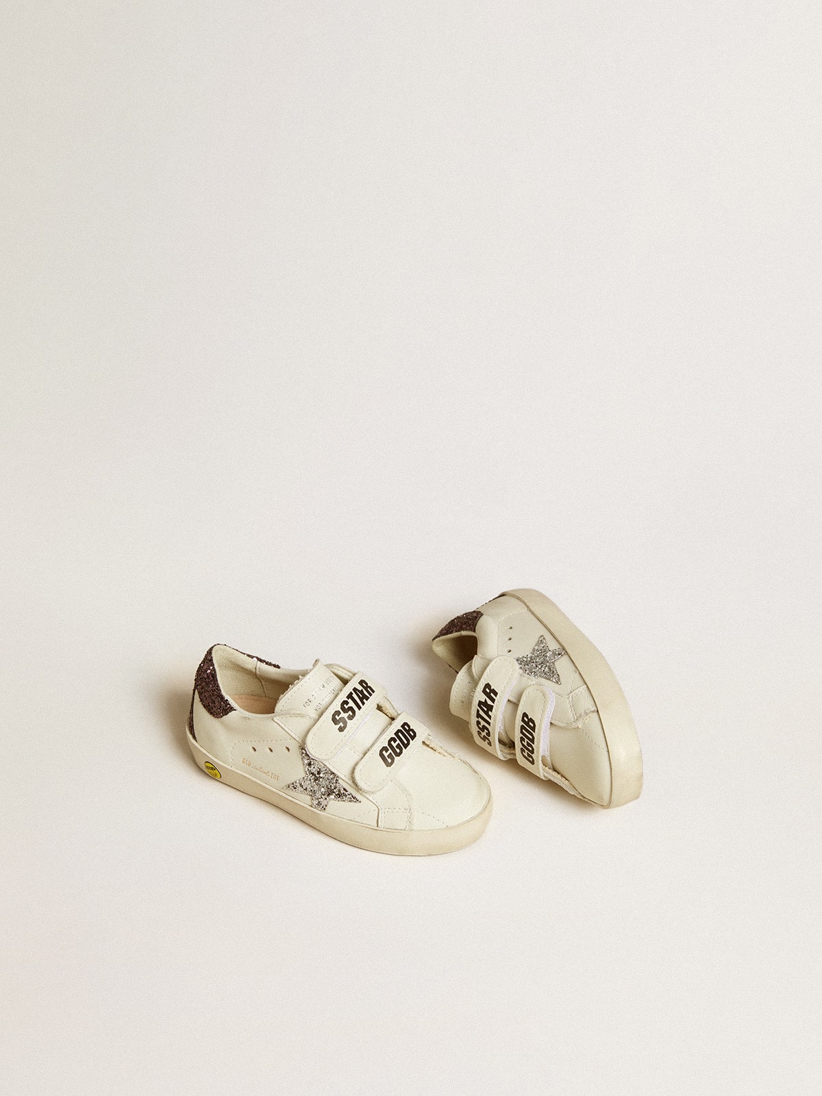 Old School Young with silver glitter star and glitter heel tab