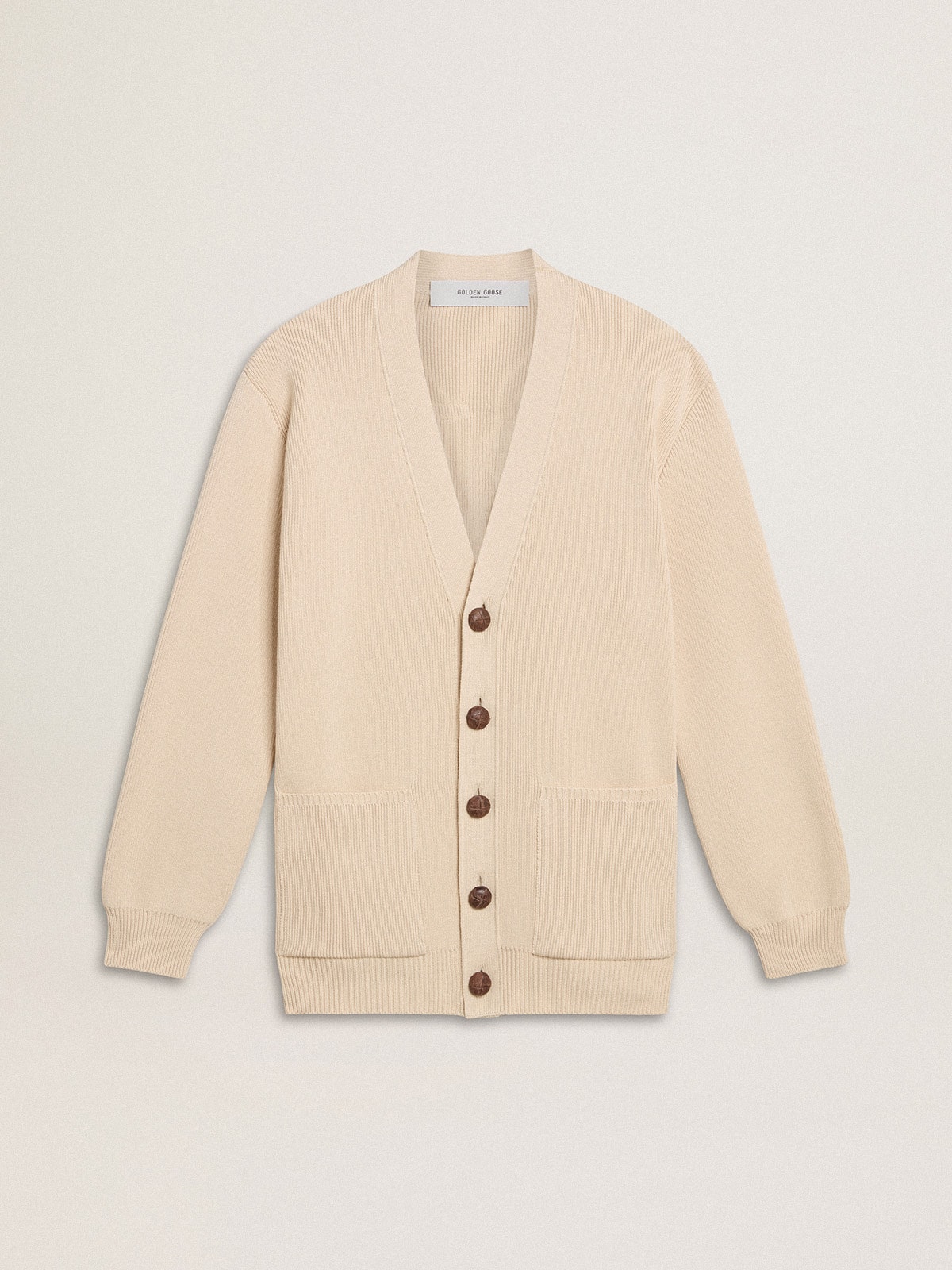 Women's beige cardigan with 'Golden' lettering on the back
