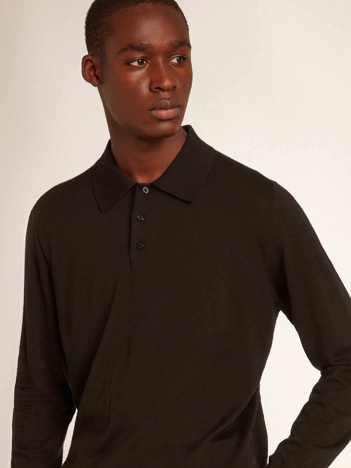 Men's long-sleeved polo shirt in black merino wool