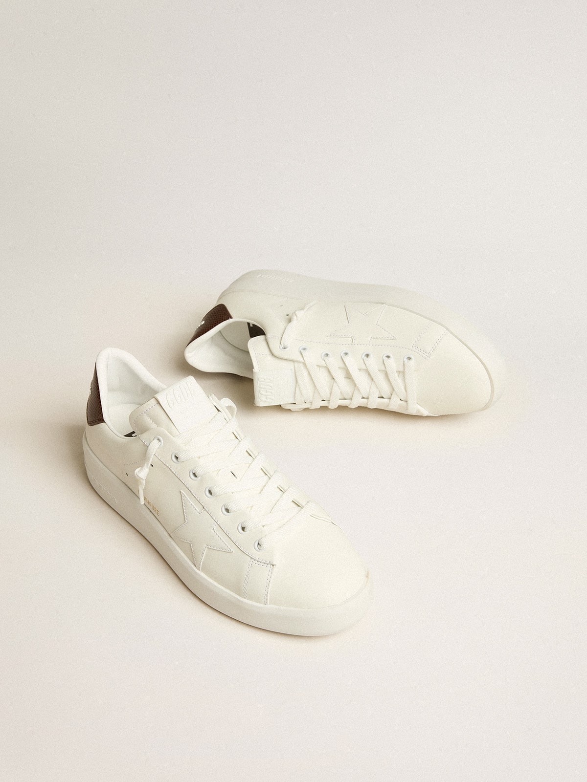 Purestar with white star and burgundy lizard-print heel tab
