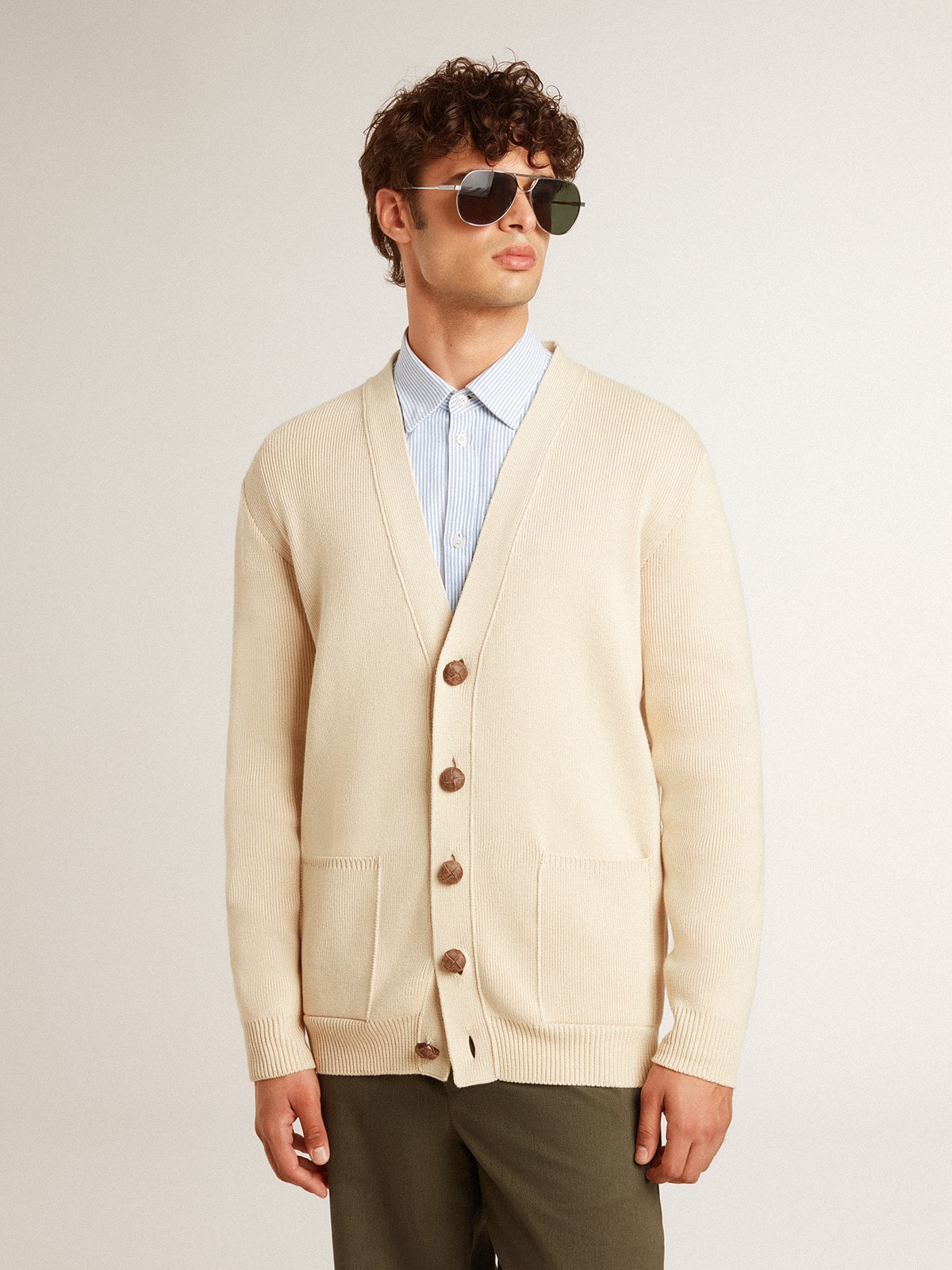 Men's beige cardigan with 'Golden' lettering on the back