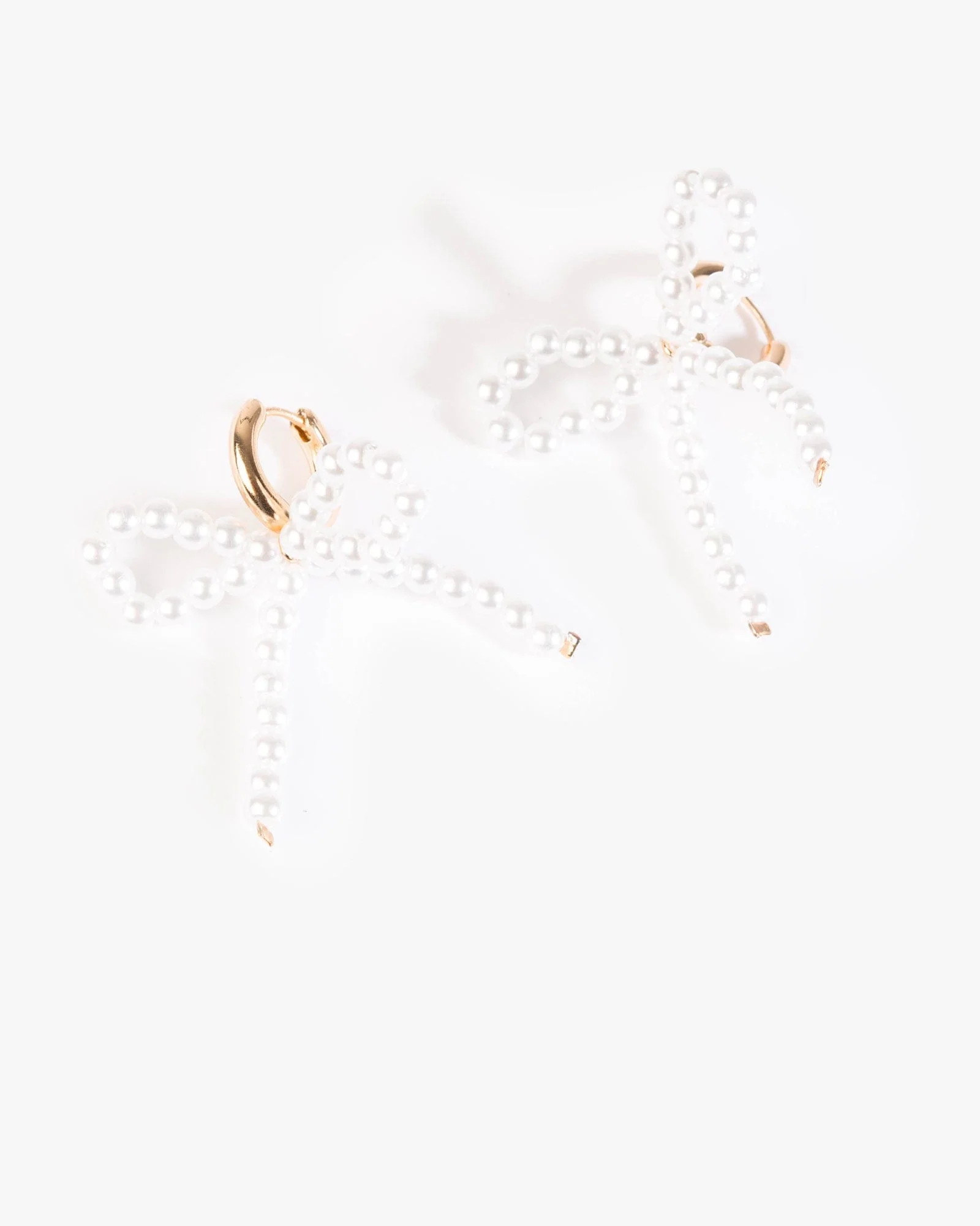 White Beaded Bow Huggie Hoop Earrings