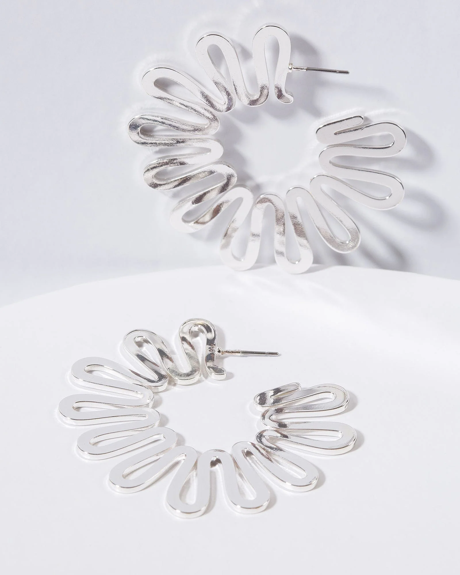 Silver Swirled Round Statement Earrings