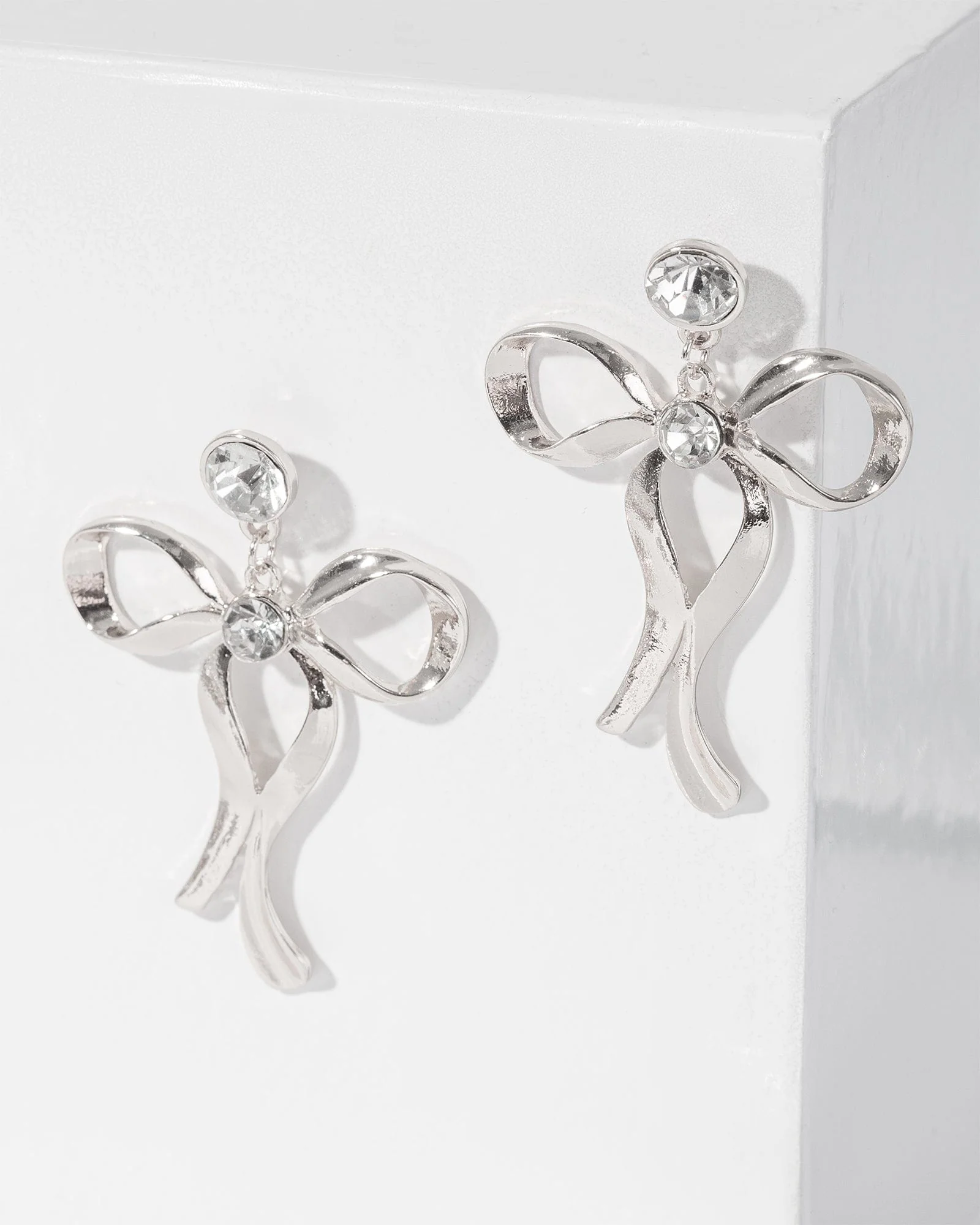 Silver Metal Bow Drop Earrings