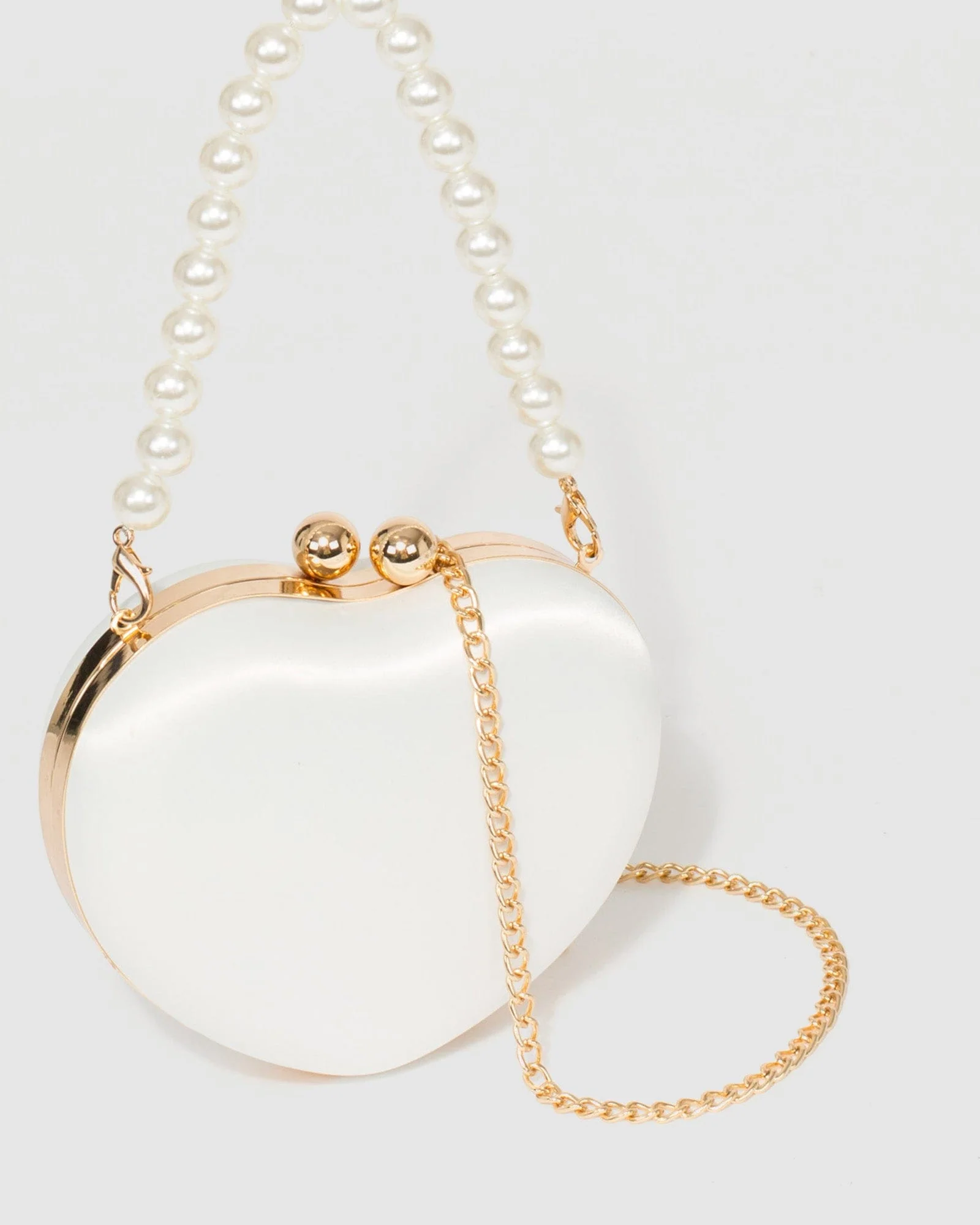 White Pearl Handle Heart Clutch Bag