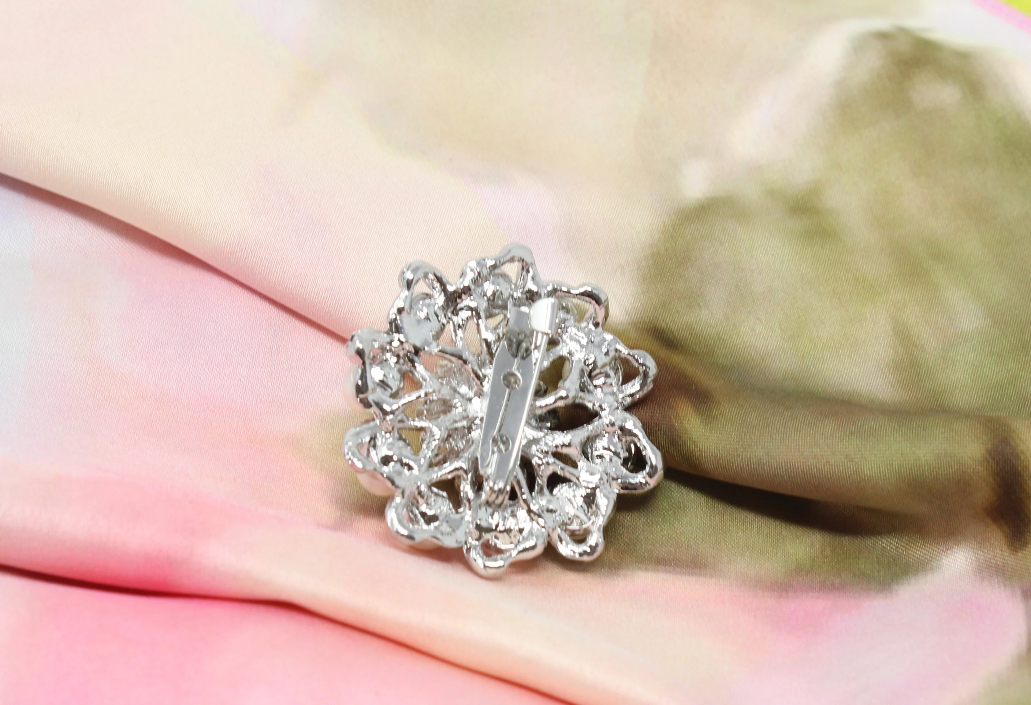 Silver pearl brooch