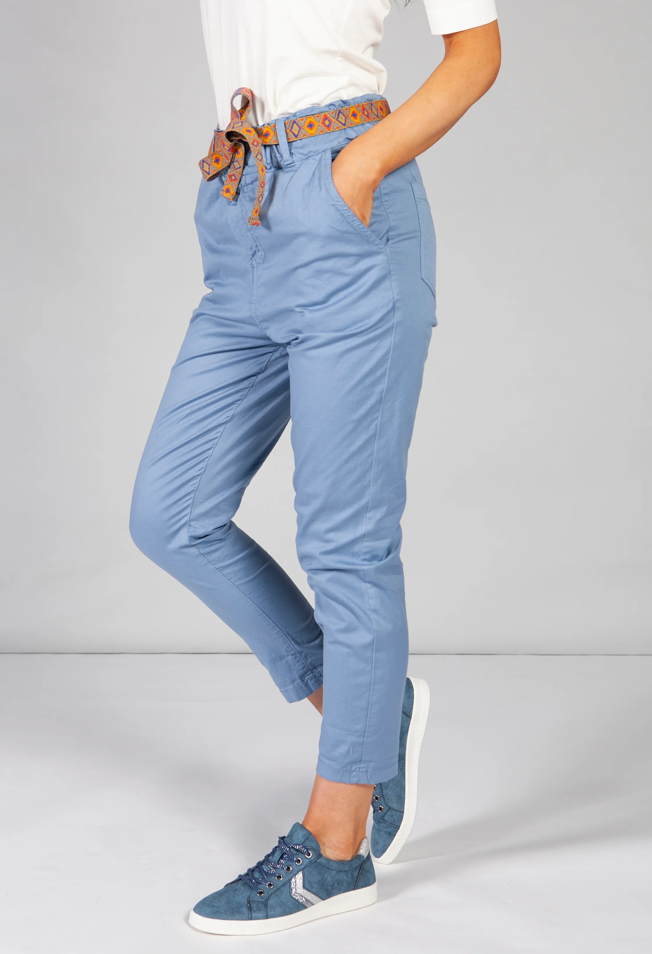 blue chino trousers with aztec print belt
