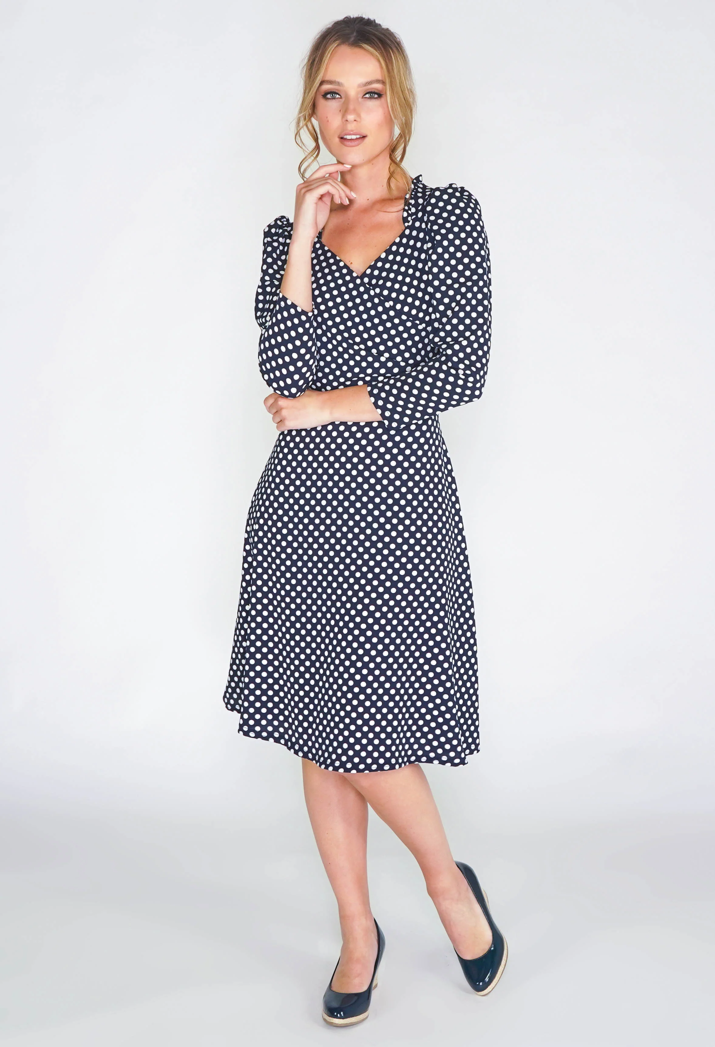 navy dress in polka dot print