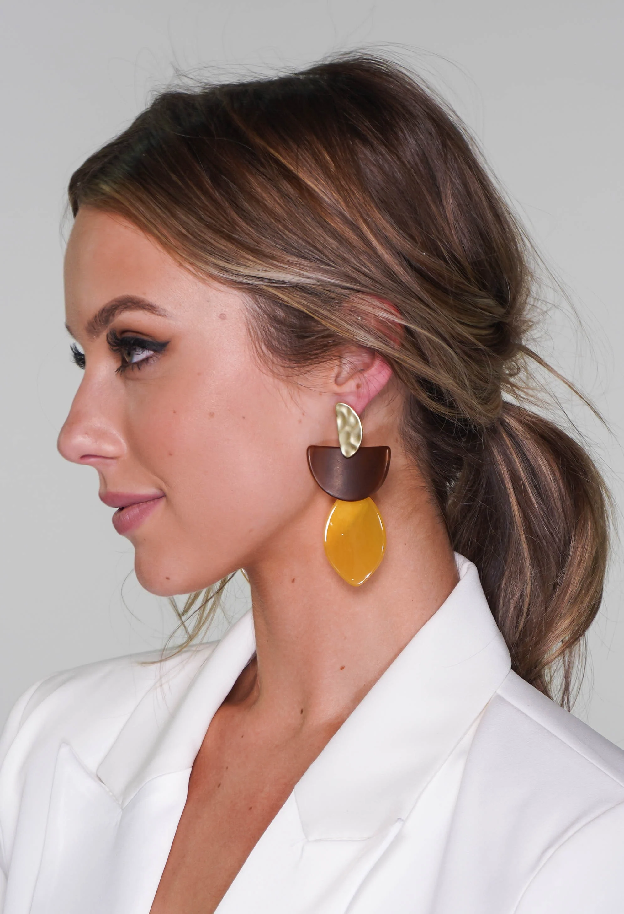 earrings in gold and yellow