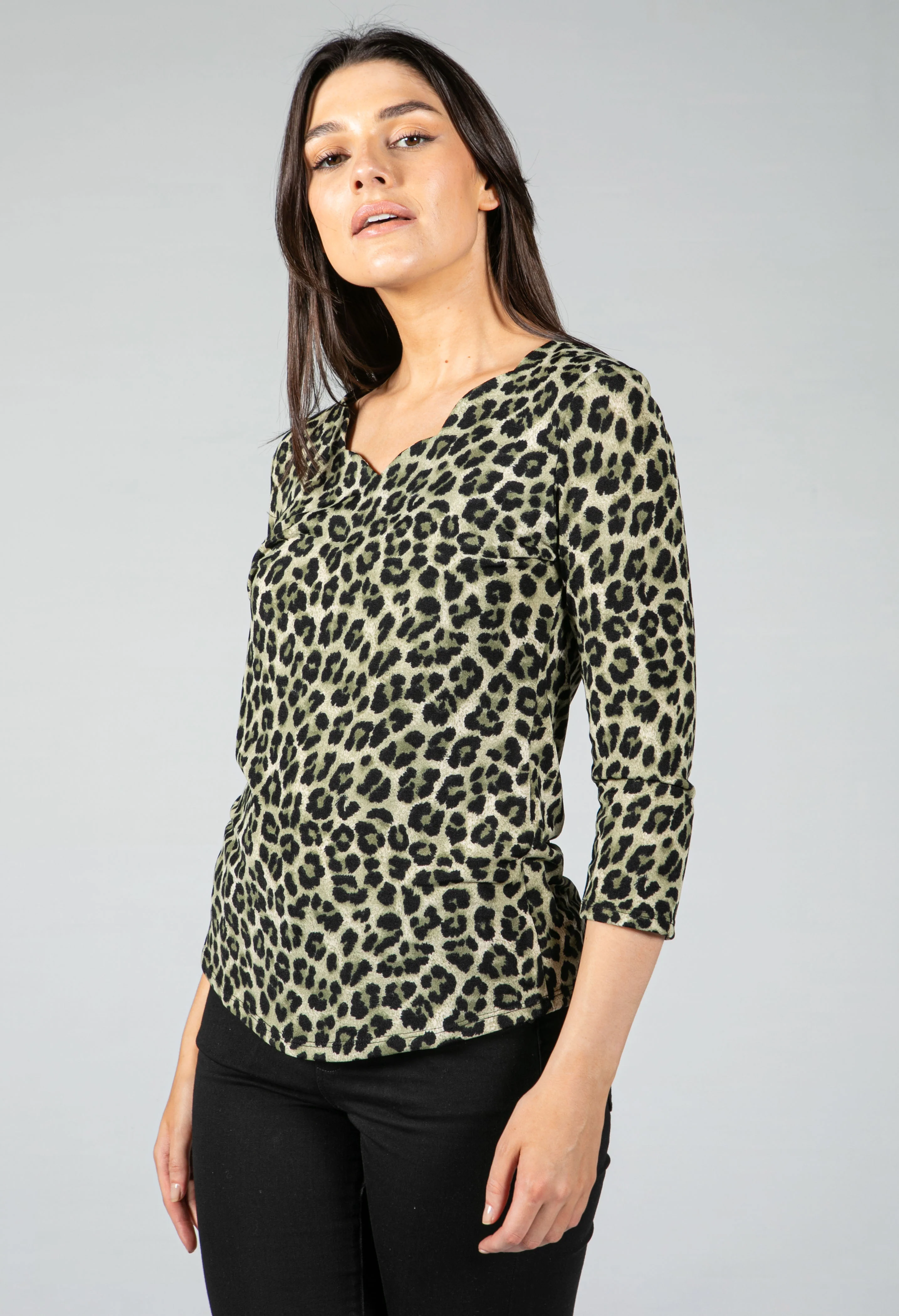 Scallop V neck top in green animal print