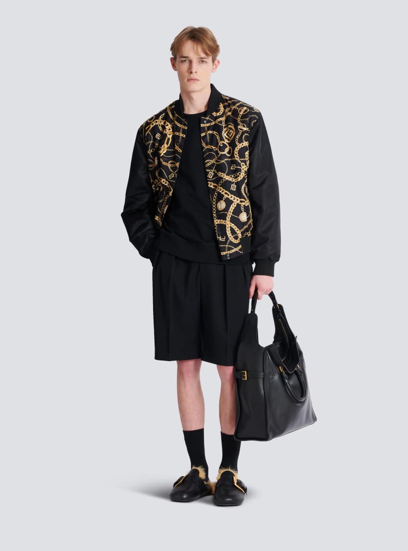 Reversible printed bomber jacket with Chaînes pattern