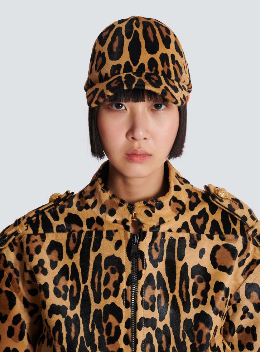 Ponyskin-style leather cap with leopard pattern