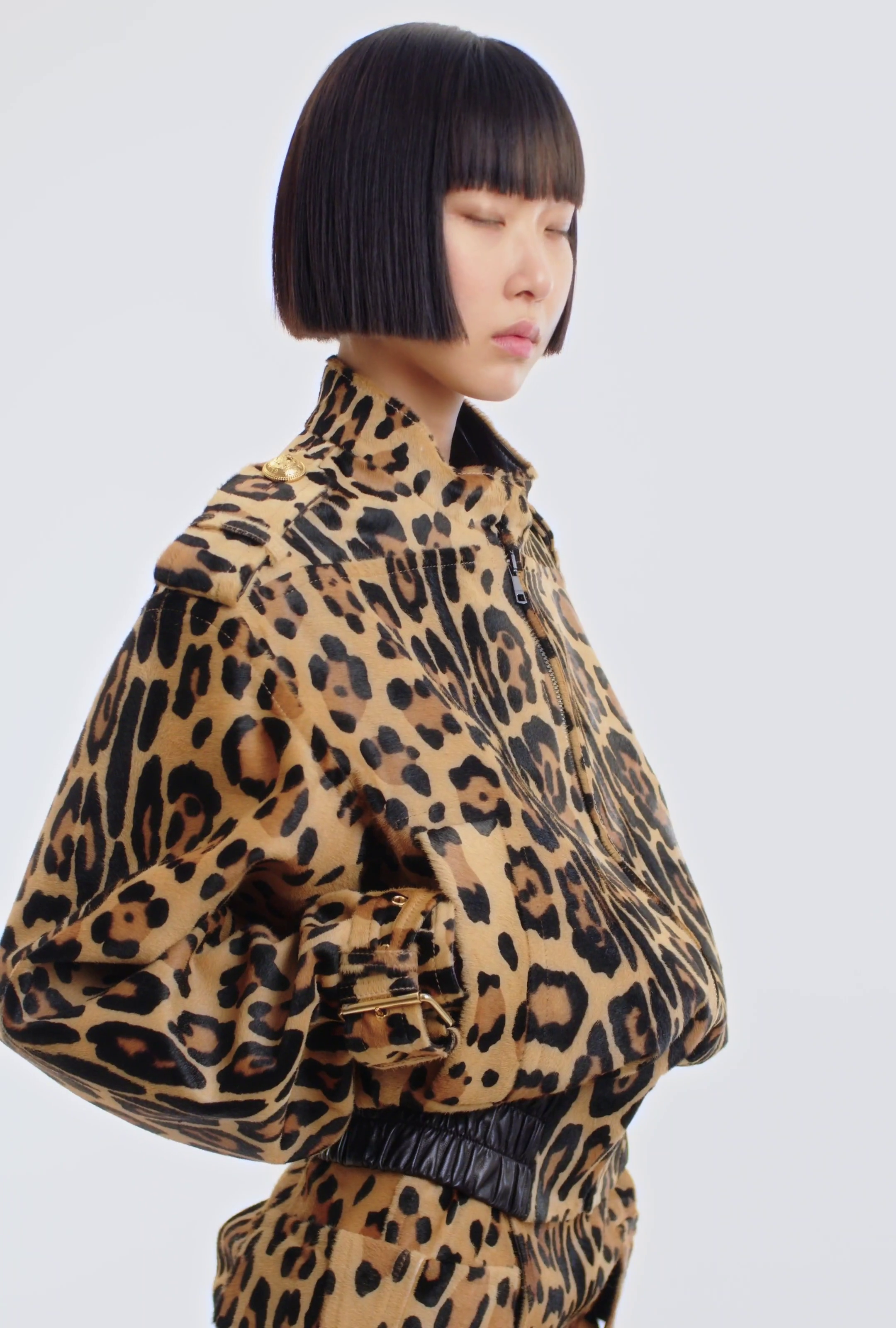 Ponyskin-style leather bomber jacket with leopard pattern