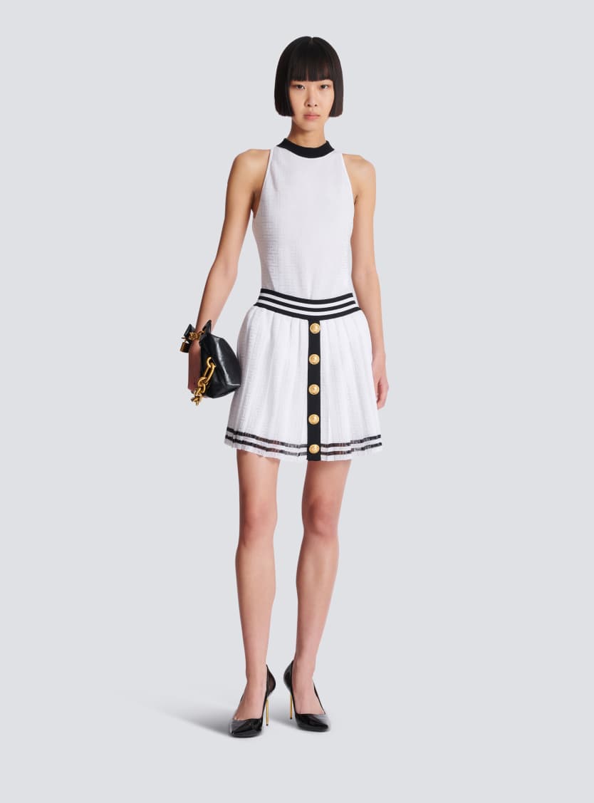 Pleated monogrammed knit skirt