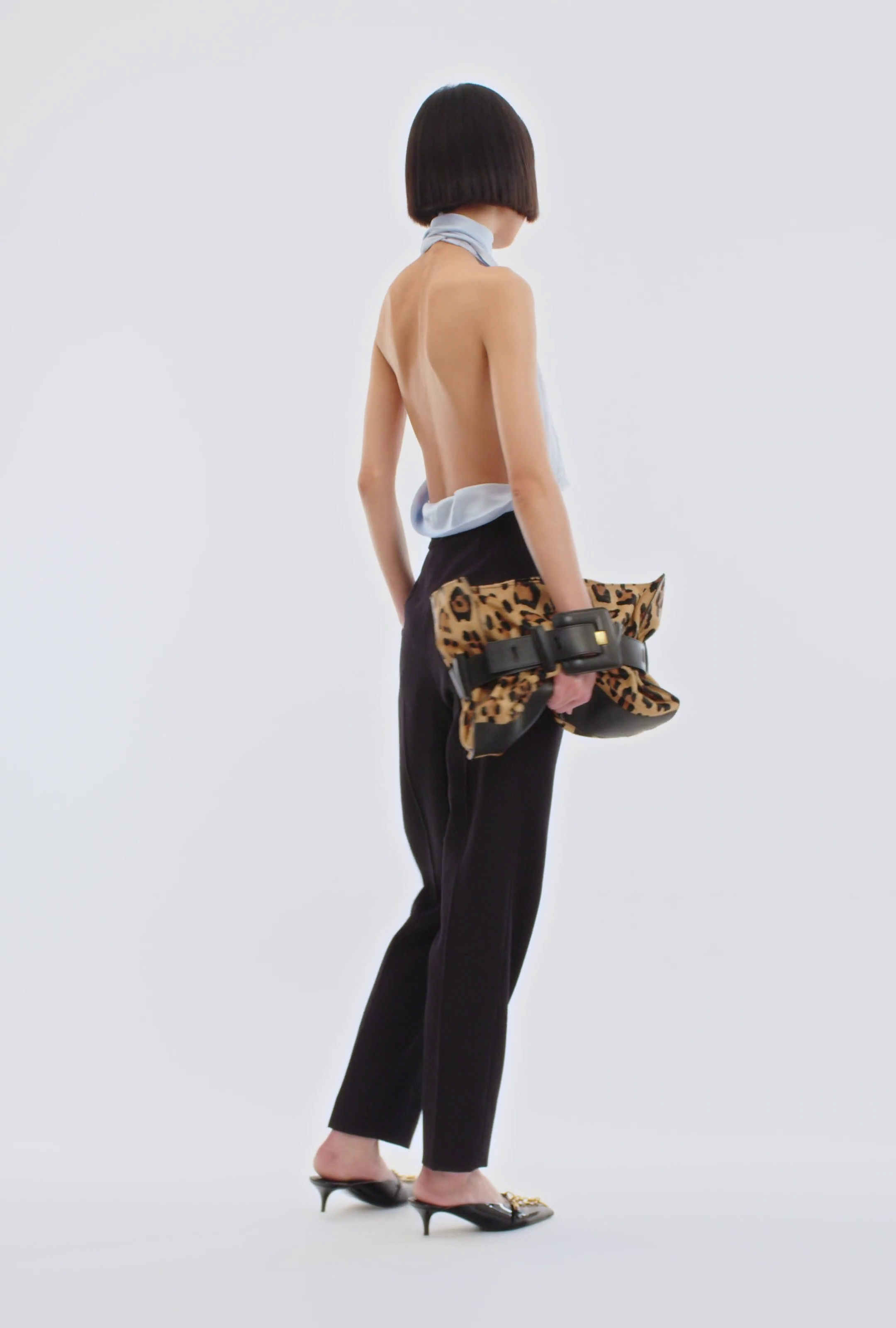 Backless fringed satin top
