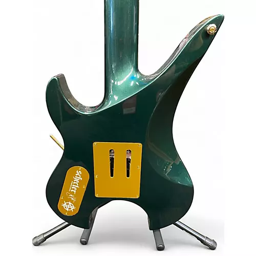 Used Schecter Guitar Research SYNYSTER GATES CUSTOM 7 HEADLESS TR OAK GREEN METALLIC Solid Body Electric Guitar OAK GREEN METALLIC - musicians--Friend