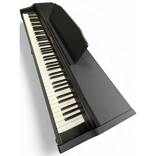 Used Roland RP102 Digital Piano