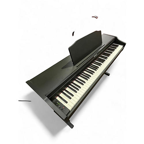 Used Roland RP102 Digital Piano