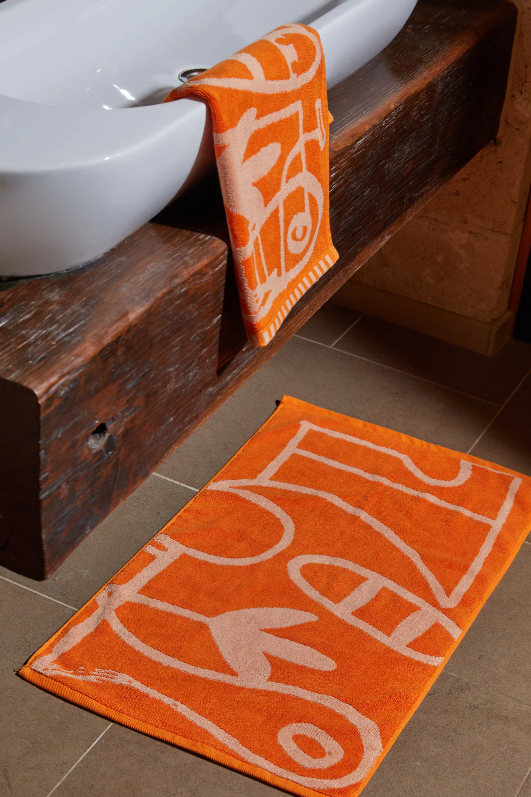 Speechless Orange Bath Mat