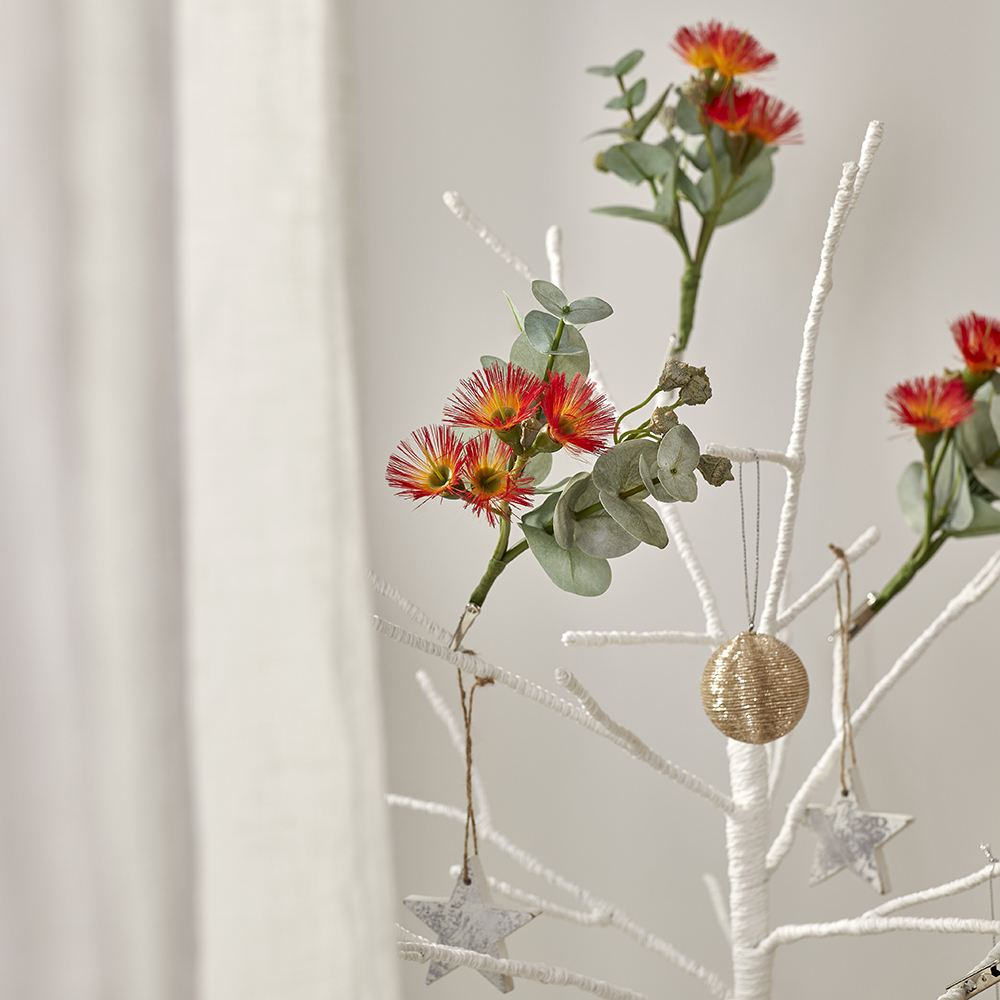 Festive Green & Red Flowering Gum Sprig