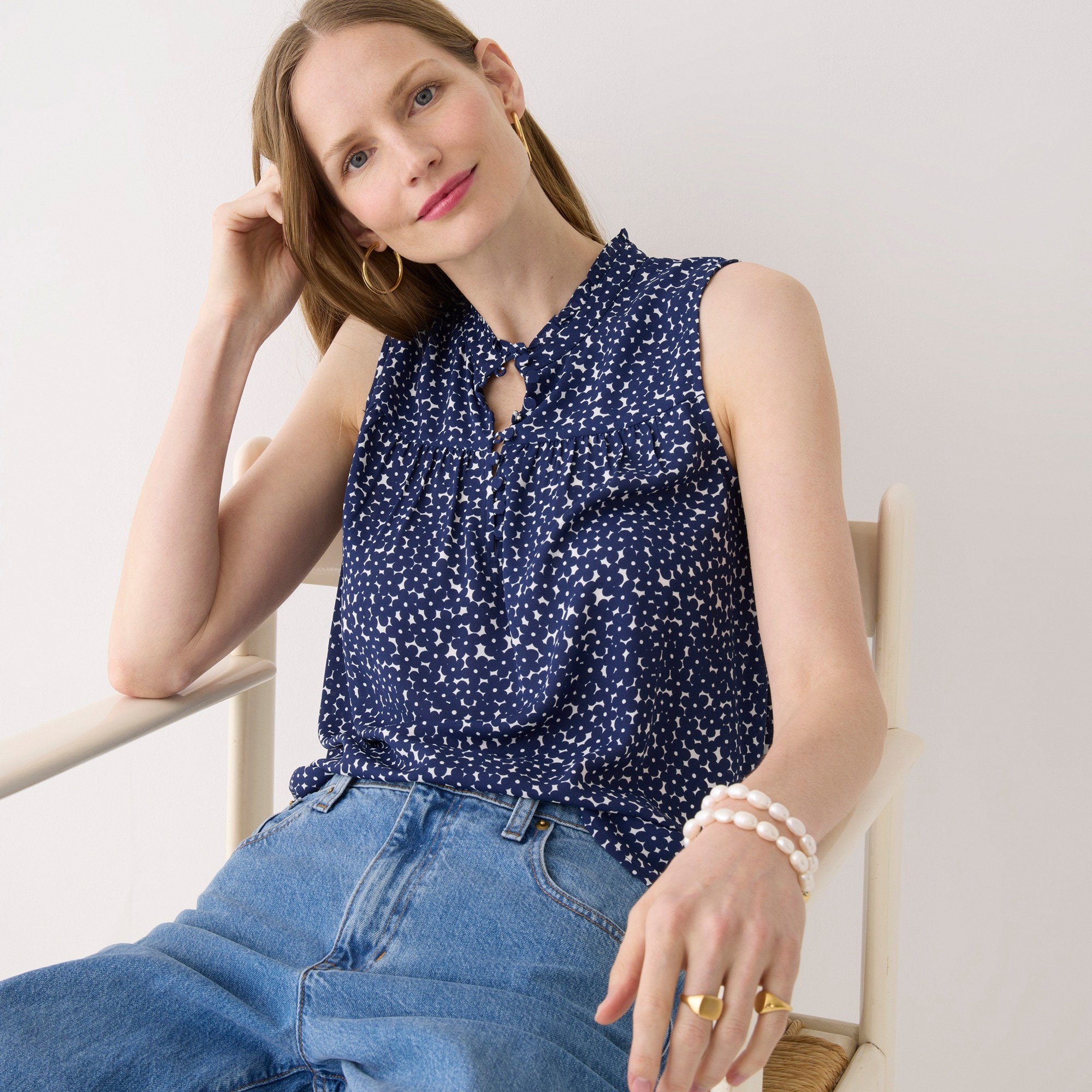 Sleeveless button-front ruffleneck popover in navy floral