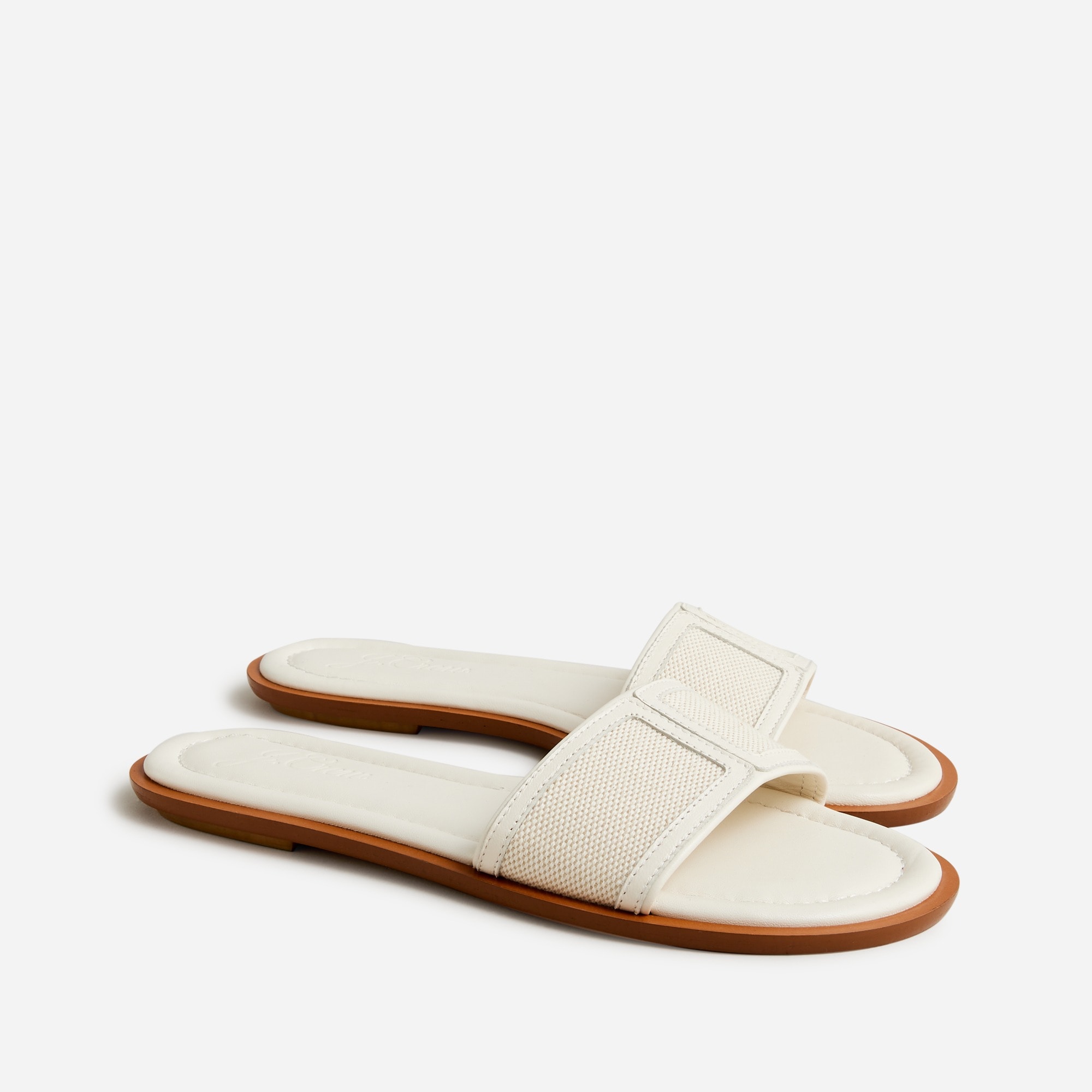 Slide sandals in canvas and leather