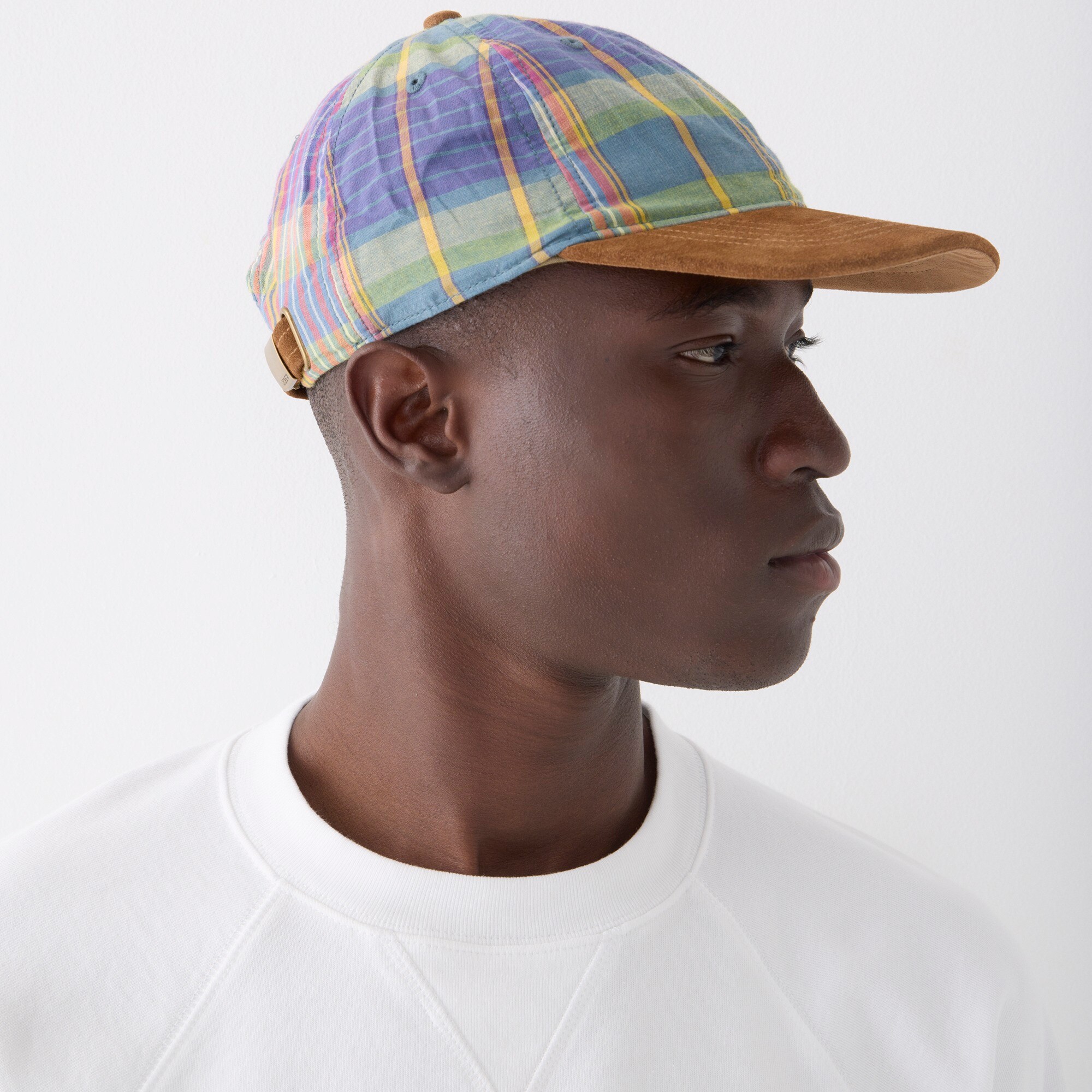 Baseball cap in plaid with suede brim