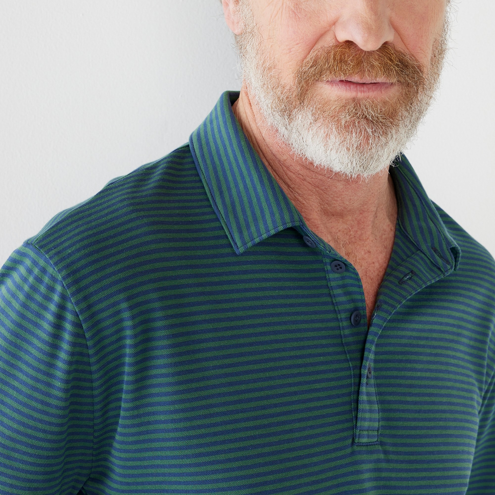 Performance polo shirt with COOLMAX® in stripe