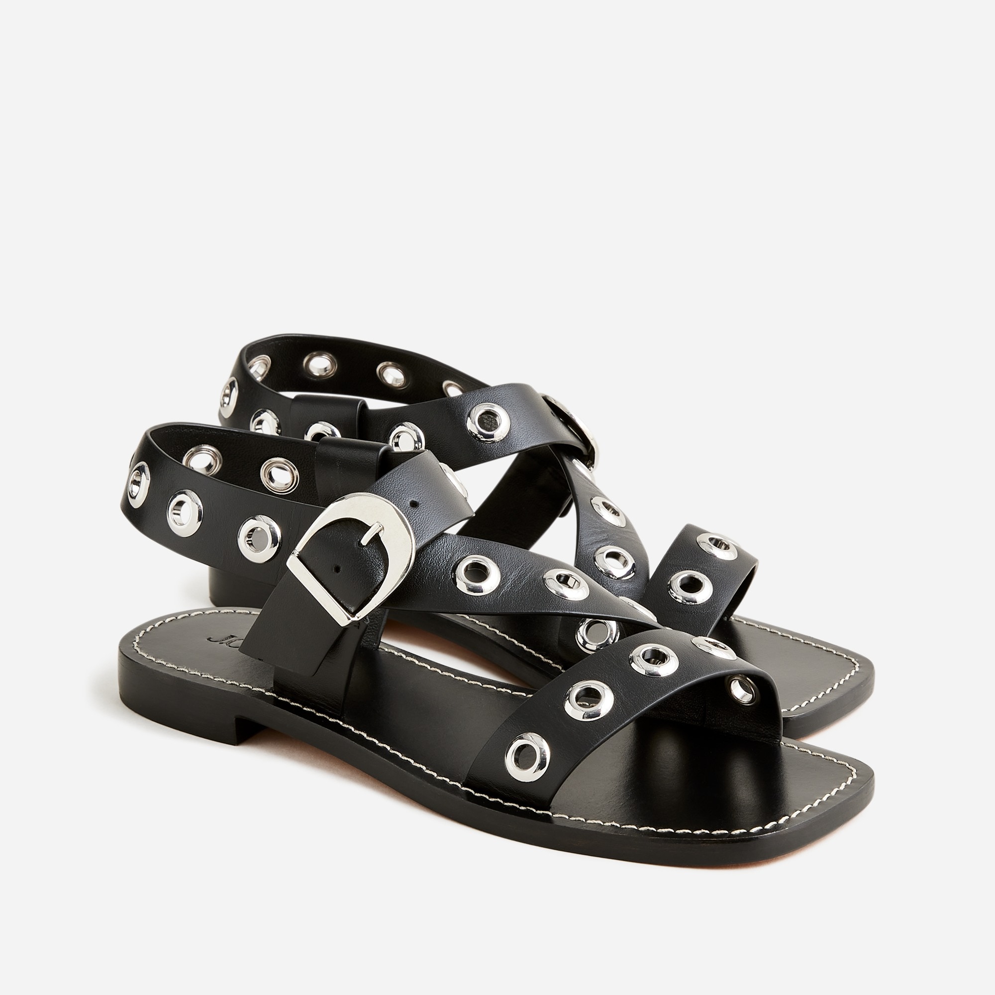 Grommet cross-strap sandals in leather