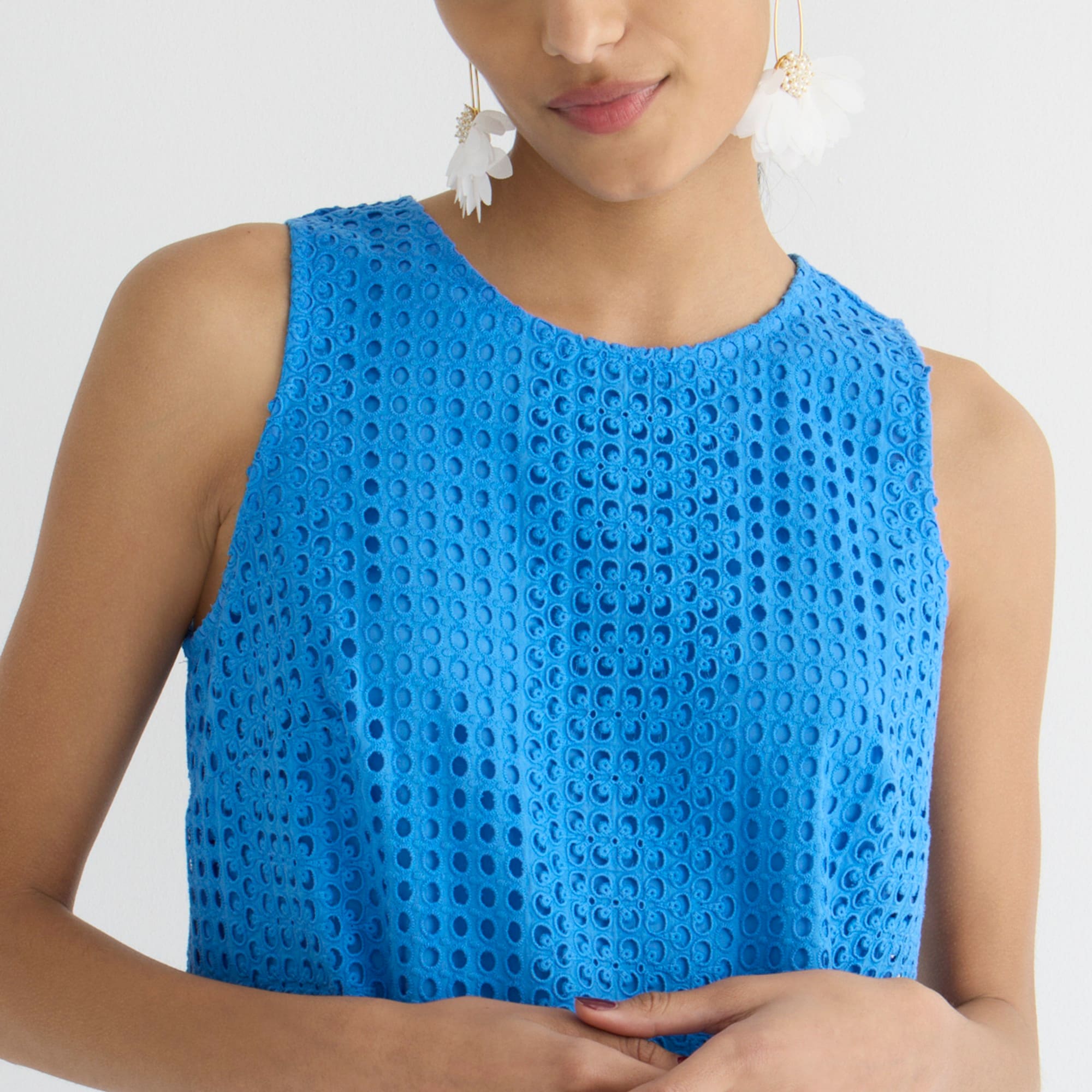 Pleated-hem shift dress in eyelet