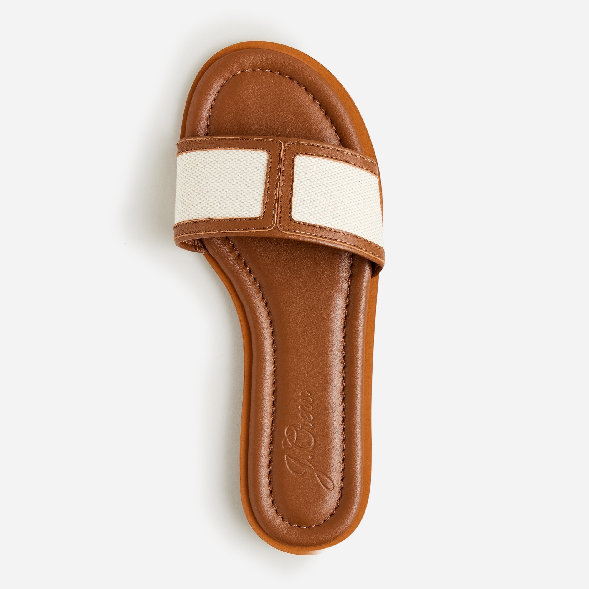 Slide sandals in canvas and leather