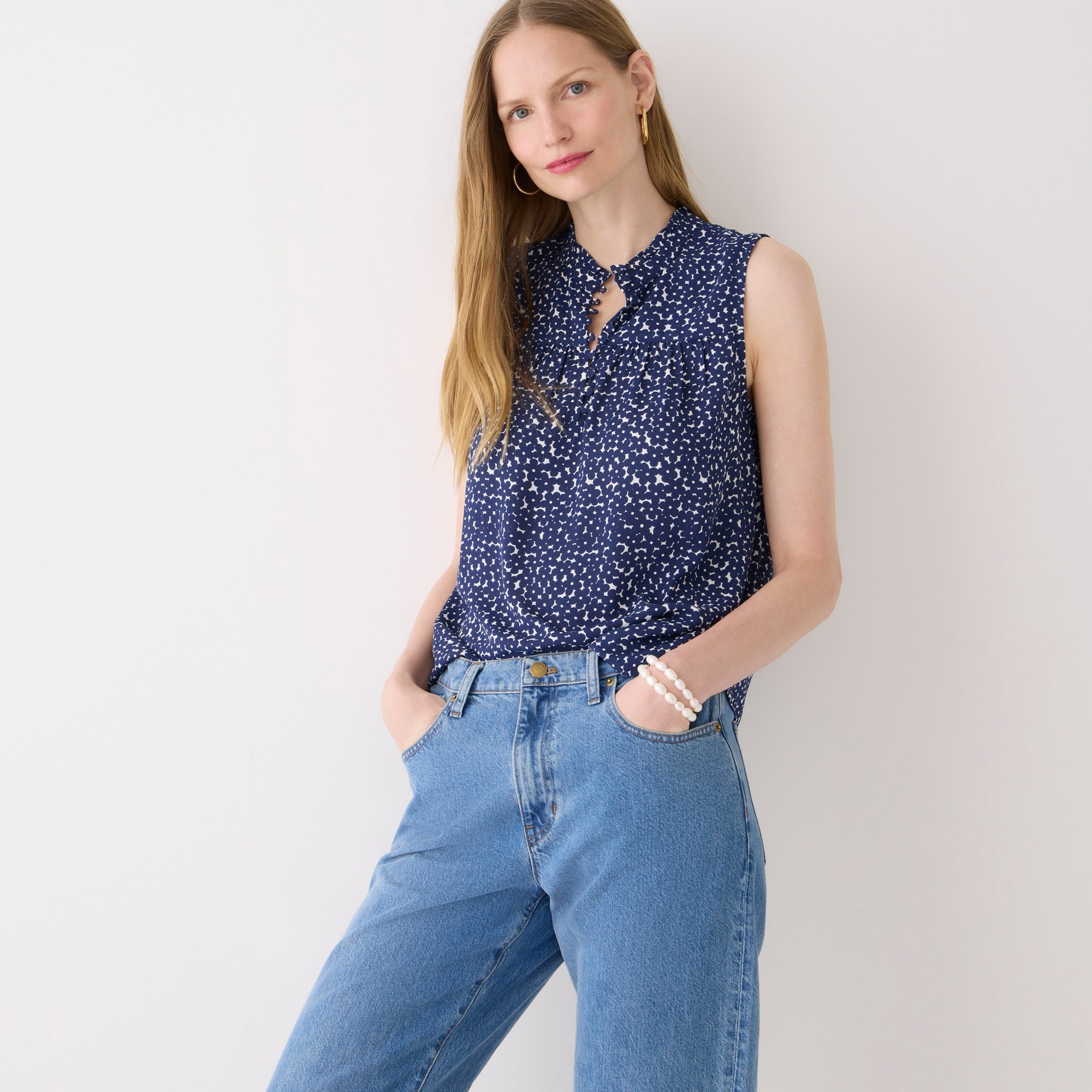 Sleeveless button-front ruffleneck popover in navy floral
