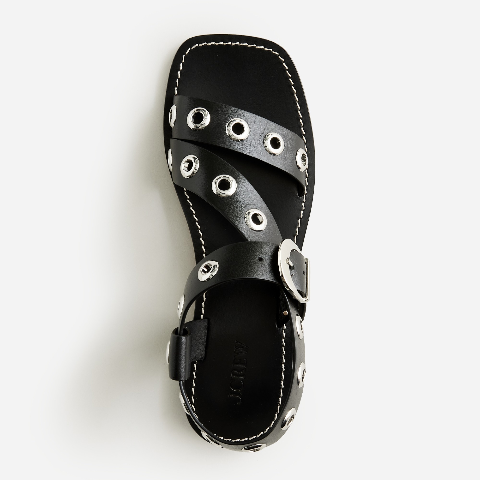 Grommet cross-strap sandals in leather