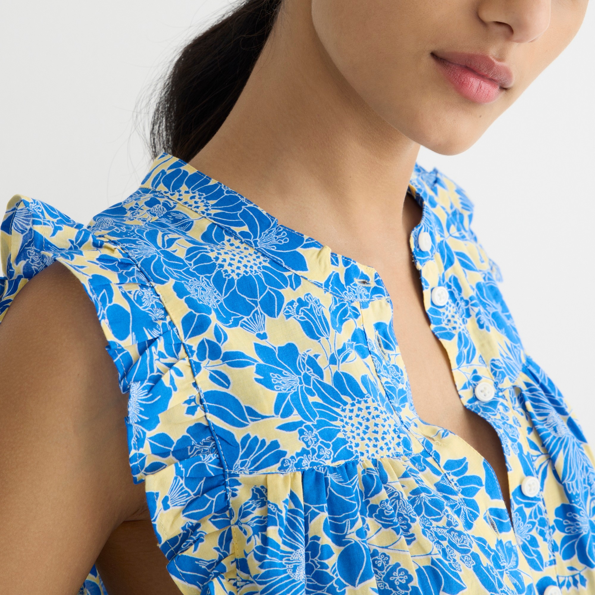 Sleeveless ruffle-trim top in blue floral