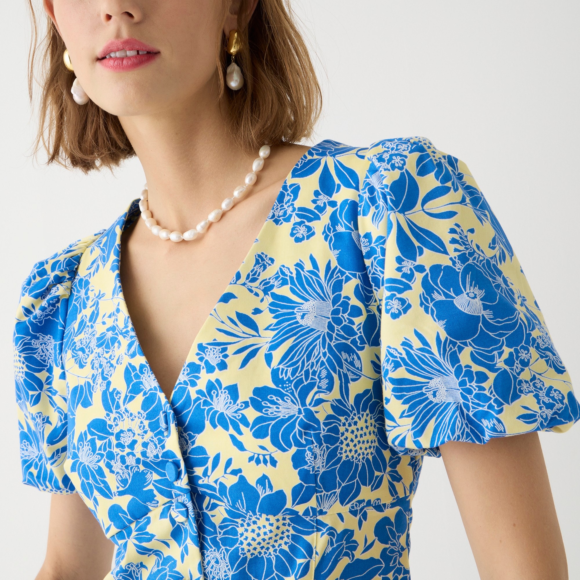 Button-front puff-sleeve mini dress in blue floral twill