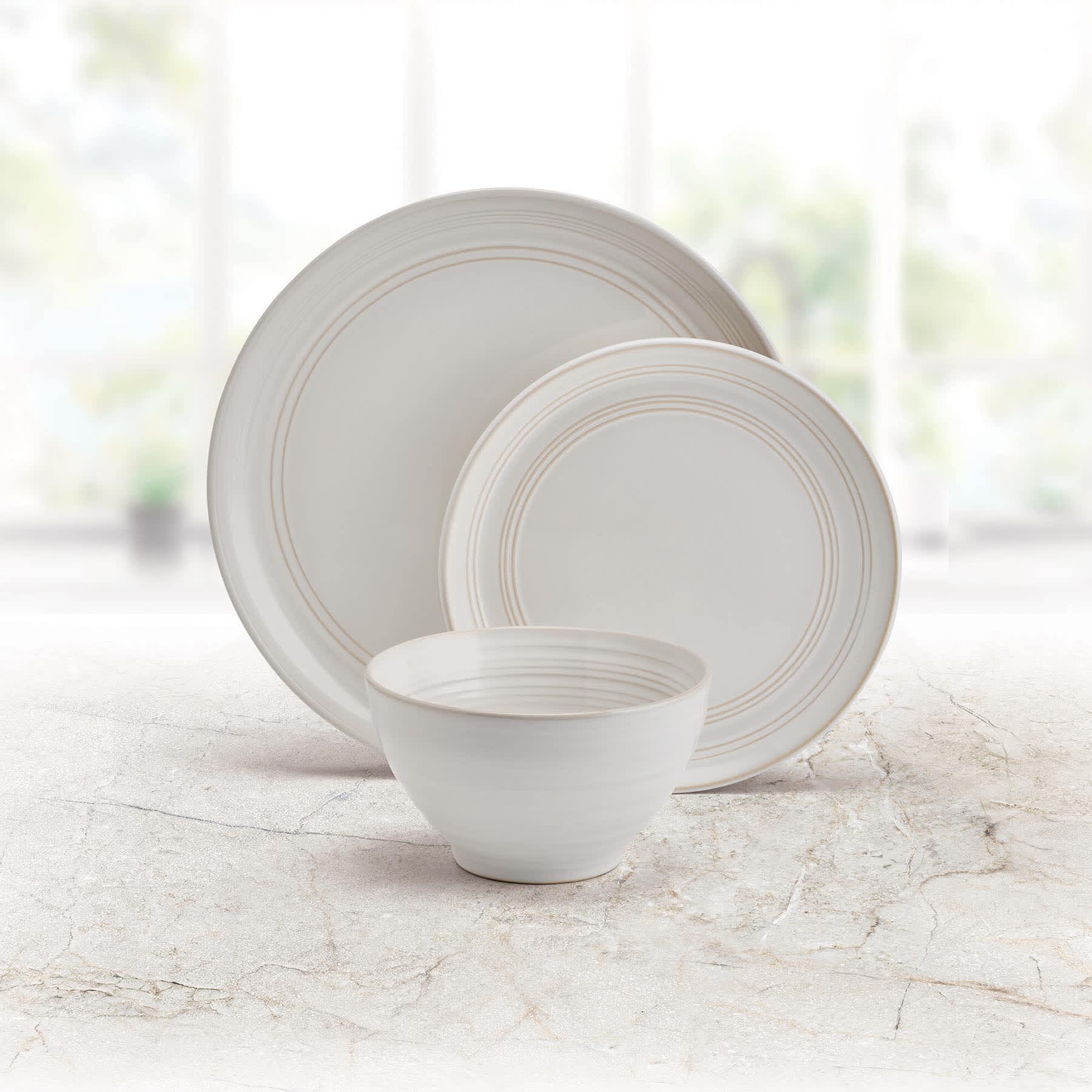 12-Piece Drea White Stoneware Dinnerware Set