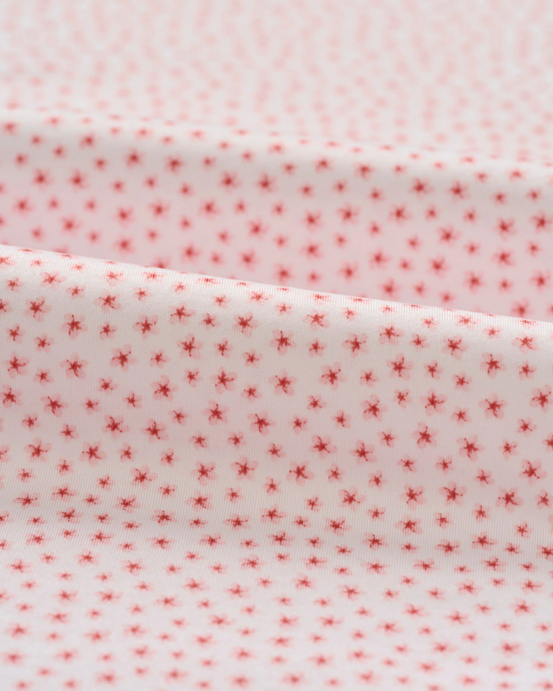 Featherweight Performance Polo - Plumeria