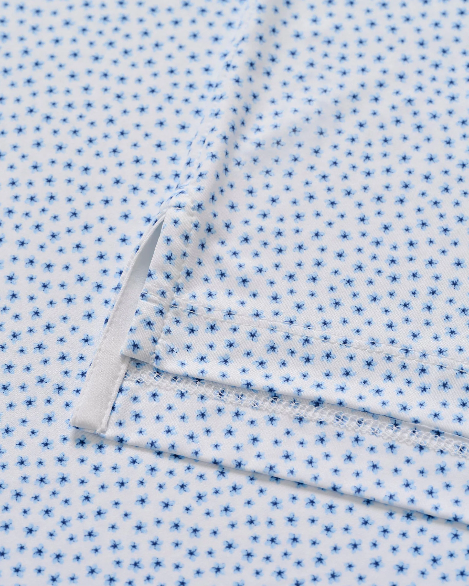 Featherweight Performance Polo - Plumeria