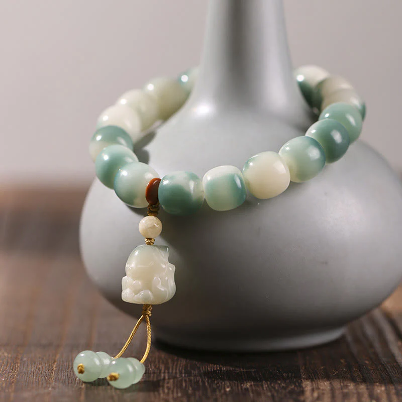 Buddha Stones Gradient Bodhi Seed Nine Tailed Fox Cat Paw Claw Pine Cone Peace Bracelet