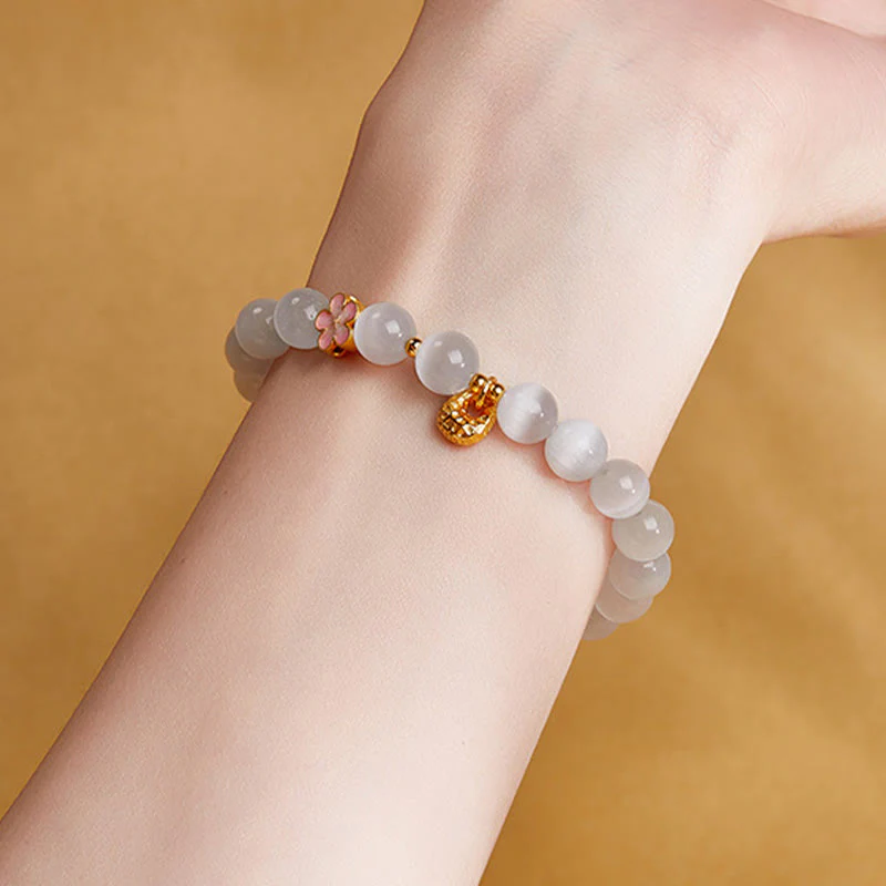 Buddha Stones 925 Sterling Silver Peach Blossom Lucky Bag White Cat's Eye Luck Bracelet