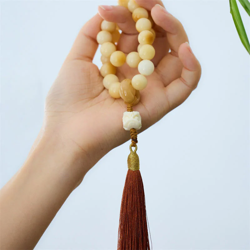 Buddha Stones Natural Bodhi Seed Ivory Fruit Dancing Lion Charm Harmony Tassel Wrist Mala
