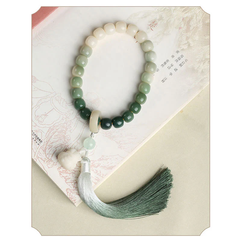 Buddha Stones Natural Gradient Bodhi Seed Fortune Money Bag Lotus Wisdom Tassel Wrist Mala