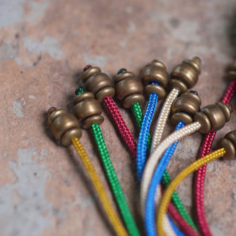 Buddha Stones Tibet Ebony Wood Copper Peace Tassel Wrist Mala Bracelet