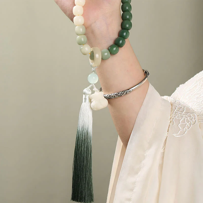 Buddha Stones Natural Gradient Bodhi Seed Fortune Money Bag Lotus Wisdom Tassel Wrist Mala